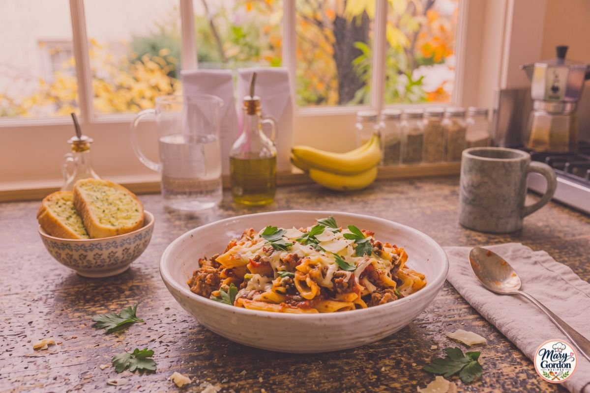 One-pot beef pasta with ground beef, tomato sauce and melted cheese