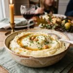 Creamy brown butter mashed potatoes topped with golden brown butter and fresh chives